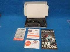 Taurus TX22 .22LR semi-auto pistol.  SN 1PT329299.  Includes one magazine, manual, and original box.