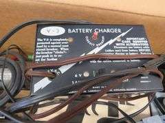 Vintage sabre saw and sander, battery charger, and more
