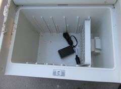 12 volt electric heating and cooling cooler.  Untested.