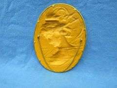 Embossed Bradley and Hubbard #1820 cast iron oval portrait