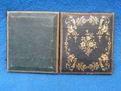Antique tintype photo in a locking case.  Very good condition.