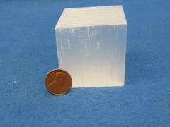 Honey Calcite Sphere and a Satin Spar Cube.  Total weight 1.15 lb.
