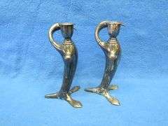 Pair of Art Nouveau era figural candlesticks.  Unknown composition.  Marked W. B. Mfg. Co. 1110.