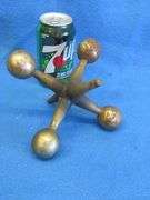 Large decorative chrome-plated cast iron toy jack.