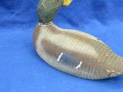 Vintage wooden duck decoy with glass eyes