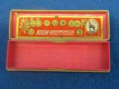 Koch like-new "Bugle Call" 10-hole diatonic harmonica in the key of G.  Sounds great.  Box is in exc