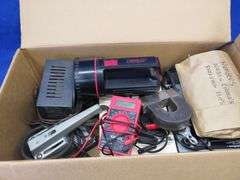 Vintage sabre saw and sander, battery charger, and more