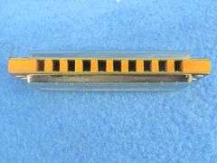 Koch like-new "Bugle Call" 10-hole diatonic harmonica in the key of G.  Sounds great.  Box is in exc