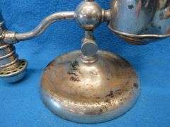 Antique unmarked oil lamp with chimney.  Missing the chimney holder.