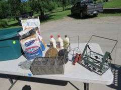 Charcoal and lighter fluid, tabletop grinding stone, resin crocodile lawn sprinkler, and more with t