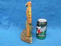 Lux wood and plaster painted parrot clock.  Movement works but hands don't move.