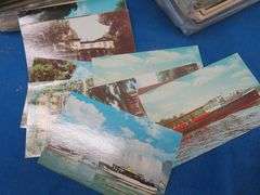 Hundreds of  Golden Era postcards both used and unused going back to the early 1900s.  RRPCs, town v