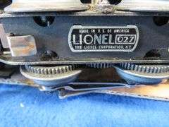 Vintage Lionel Train set with lots of cars, track, and some cool accessories