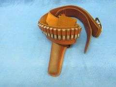 Hunter brand leather ammo belt with a Hunter brand holster.  Approx. 34".  Used with the gun in lot 
