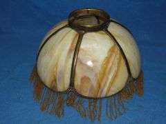 14" caramel slag glass shade with beaded fringe.  Very good condition.