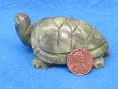 Serpentine Turtle and an Orca Agate Flame.  Total weight of .97 lb.