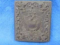 Civil-War-era tintype in a military-themed case.  Very good condition.  Hand-colored photo of a sold