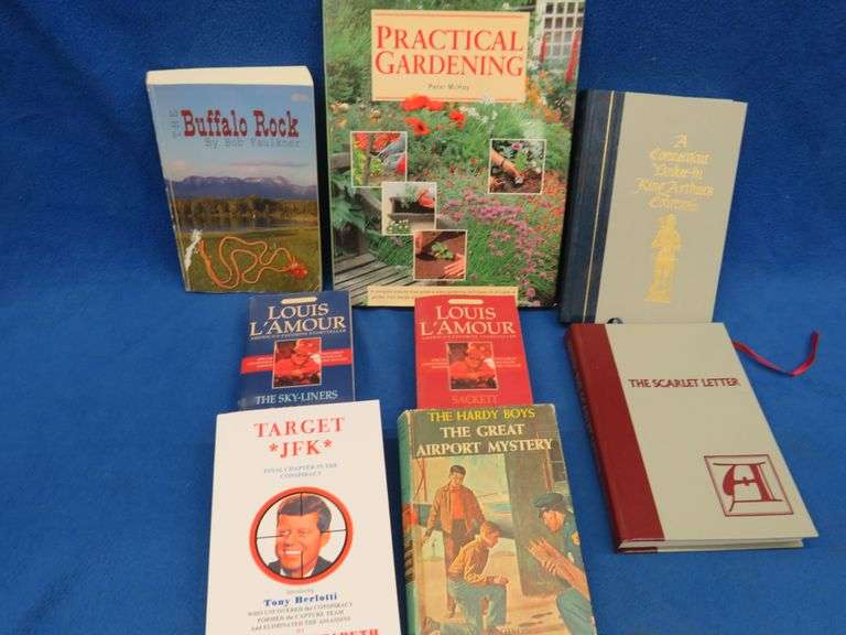 Books, including Lois L'amour and a JFK book
