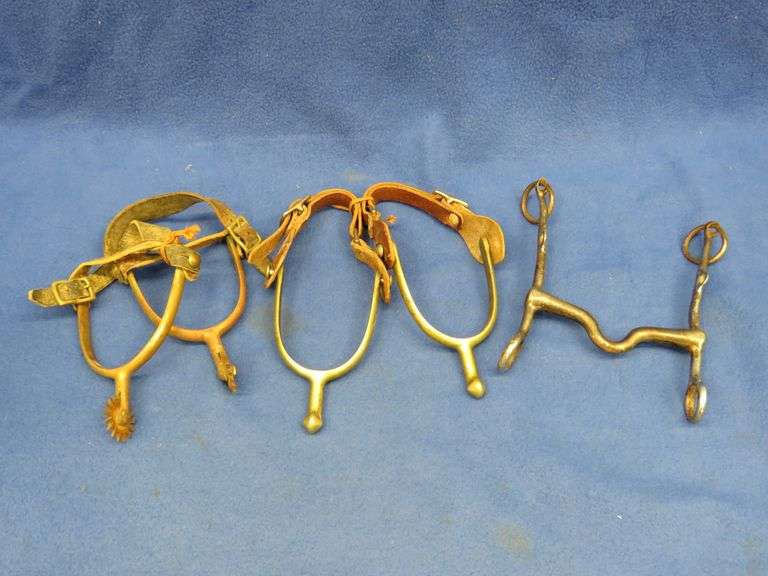 Two pair of spurs and a bit