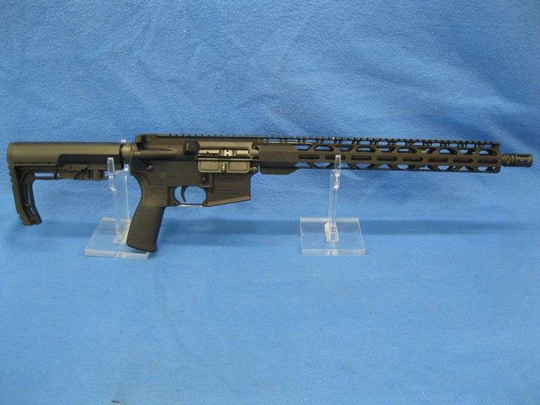 Radical Firearms RF-15 5.56 semi-auto rifle.  S/N 24-041618.  Won at a banquet and never fired.  Inc