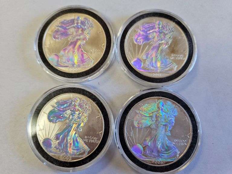 (4) COLORIZED SILVER EAGLE COINS: 2000, 2001, 2002, 2003