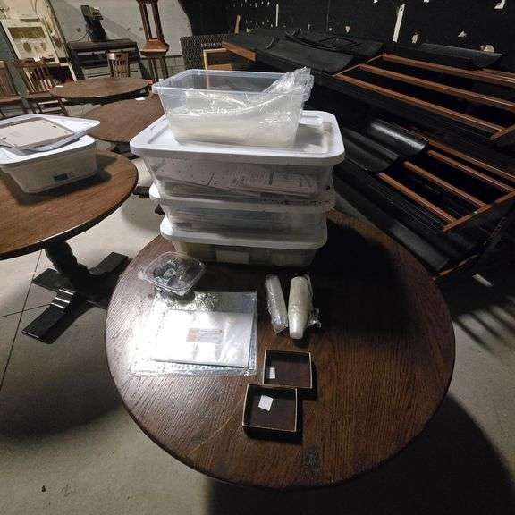 Assorted Packaging Supplies with Papers and Containers