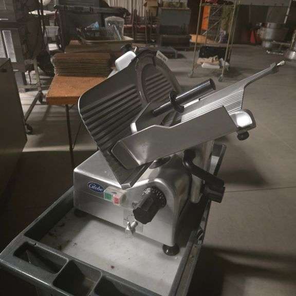 Like New (Used Less than Two Years) Globe Automatic Meat Slicer with 12" Blade and 1/2 HP Motor -...