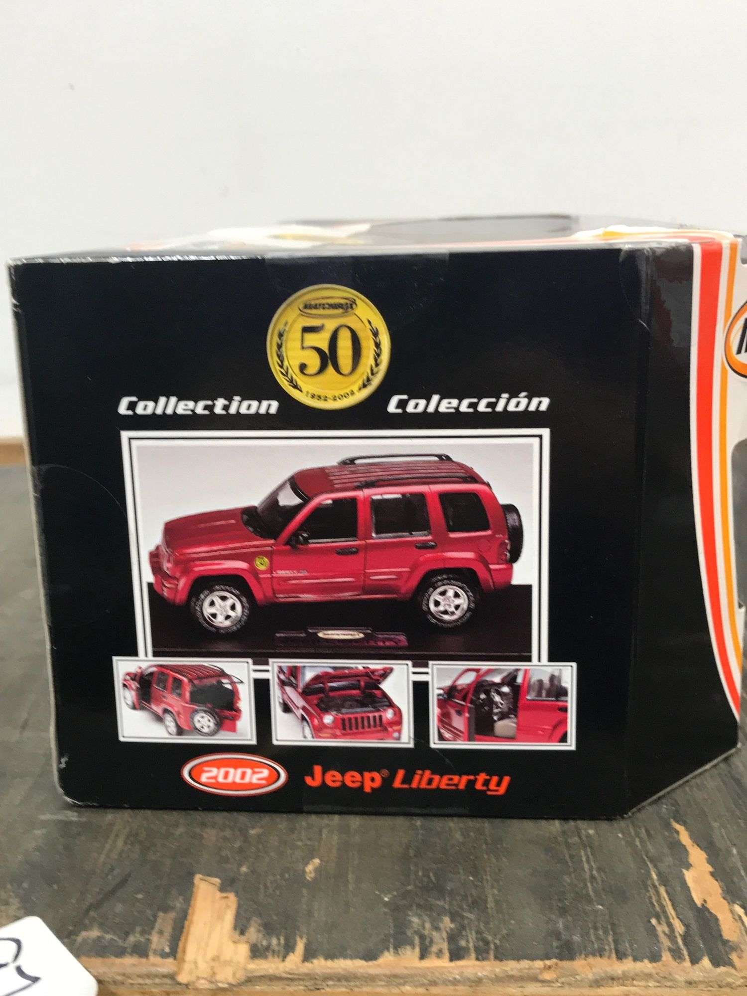Matchbox collectibles 2002 Jeep Liberty model car. 2d - Lil Dusty