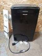 HONEYWELL MM14CCSBB PORTABLE 14,000BTU AC WITH REMOTE. WORKS GREAT. (BIN250)