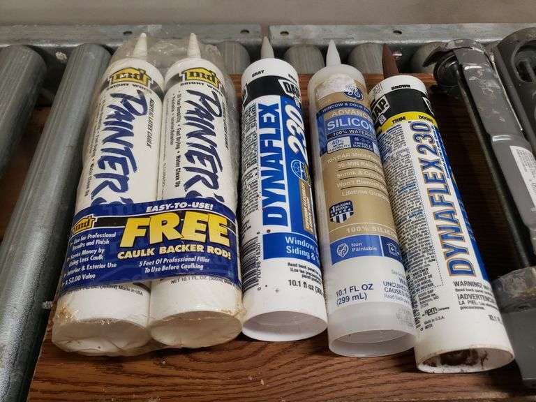 CAULK GUNS AND PRODUCT. 12B