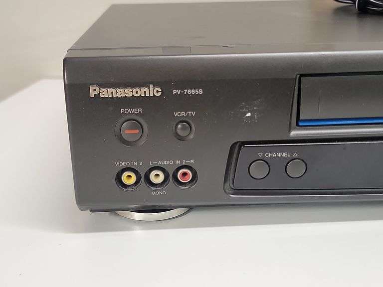 PANASONIC VHS PLAYER (PV-7665S) WITH REMOTE. 00D