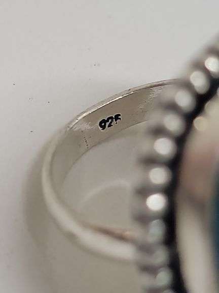 925 STERLING SILVER RING WITH BEAUTIFUL BLUE GEM. DC