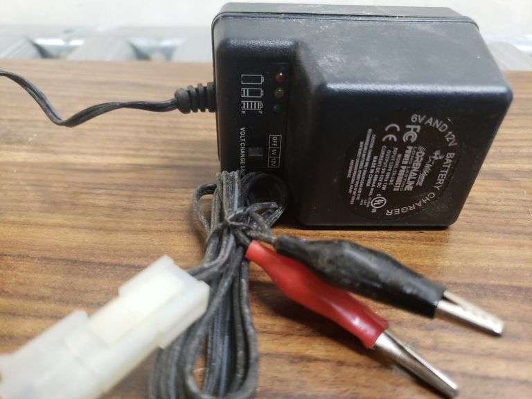 BATTERY CHARGER AND JUMP PACK. 11B