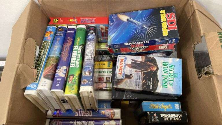 Large lot of Disney VHS movies and more. 2f