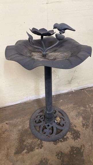 Cute black plastic birdbath