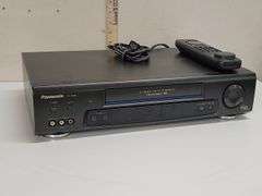 PANASONIC VHS PLAYER (PV-7665S) WITH REMOTE. 00D
