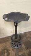 Black plastic birdbath