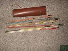 QUIVER AND 6 WOOD ARROWS