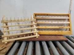 PAIR OF THREAD HOLDERS. 16D