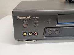 PANASONIC VHS PLAYER (PV-7665S) WITH REMOTE. 00D