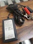 BATTERY CHARGER AND JUMP PACK. 11B
