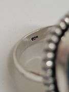 925 STERLING SILVER RING WITH BEAUTIFUL BLUE GEM. DC