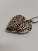 925 STERLING SILVER CUTOUT HEART NECKLACE. DC