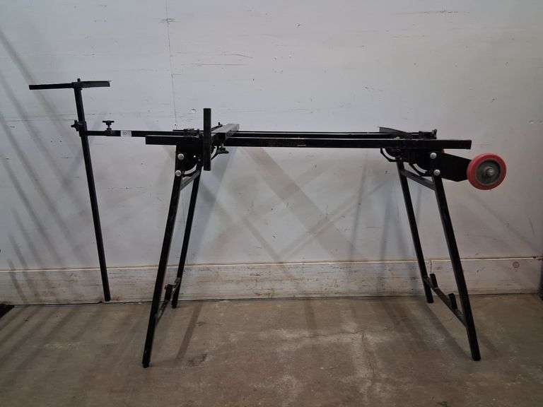 Adjustable metal work station