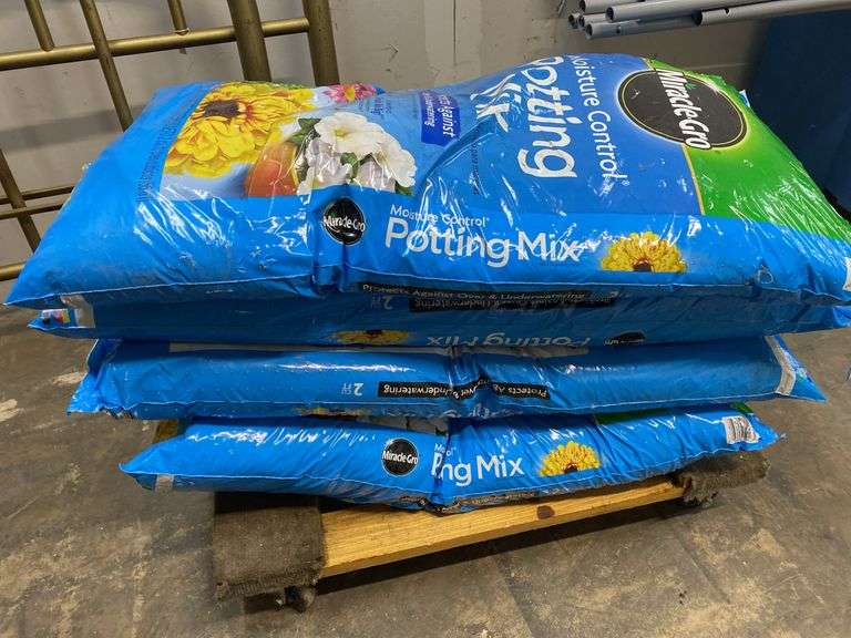 4 bags of Miracle-Gro potting mix each bag 2 cu.ft