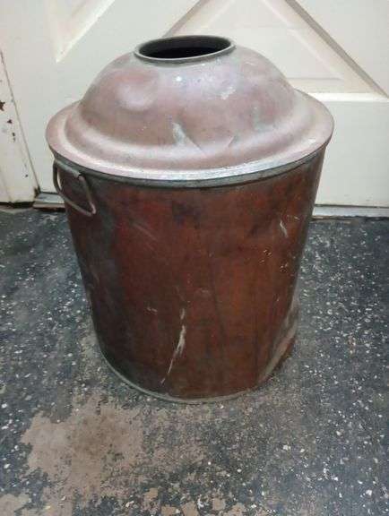 Antique copper distillery bottom