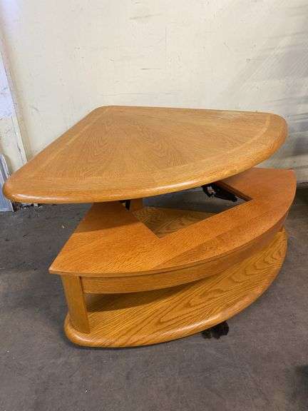 Oak triangle-shaped lift-top coffee table 42" x 55"