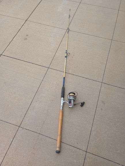 Vintage fishing pole with Ryobi reel