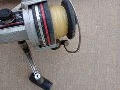 Vintage fishing pole with Ryobi reel