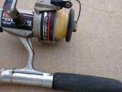 Vintage fishing pole with Ryobi reel